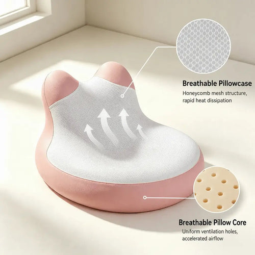 A contoured breathable pillow in soft pink and white, shown on a light beige floor with callout circles and text explaining its breathable pillowcase and breathable pillow core features.